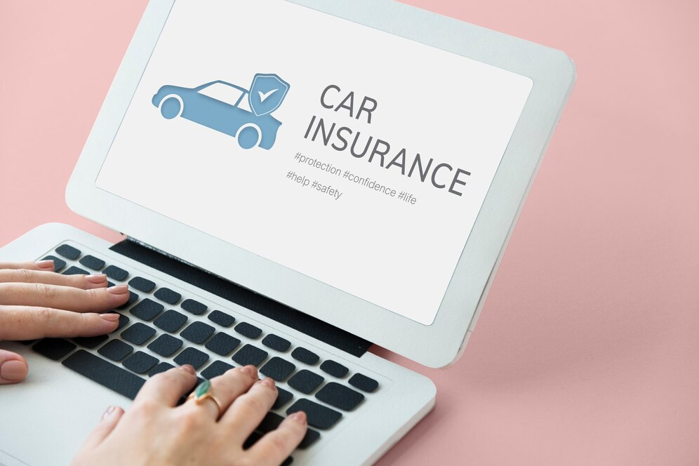 Laptop with “car insurance” displayed on the screen